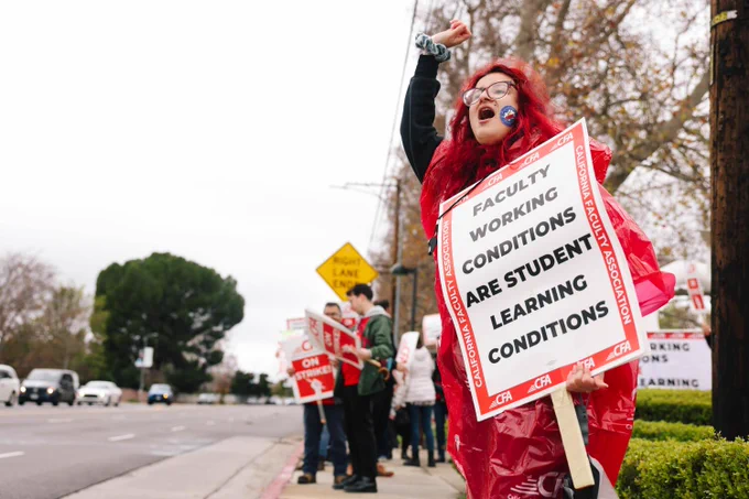 Northridge, CA - January 22: Nicolette Parra, a university student, supports her faculty during the first of an alleged five-day strike over pay at California State University Northridge on Monday, Jan. 22, 2024 in Northridge, CA. The strike is across all of the system's 23 campuses and is the largest ever faculty strike in the system's history. (Dania Maxwell / Los Angeles Times)