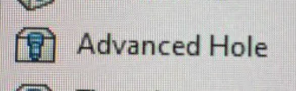 A button in a computer program reading “advanced hole” with a picture of a hole in a cube
