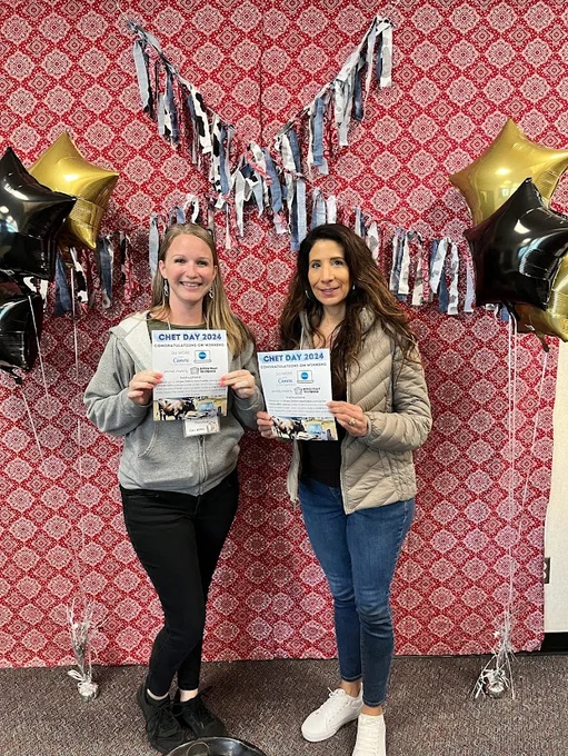 2 smiling teachers holding Ditch That Textbook course certificates