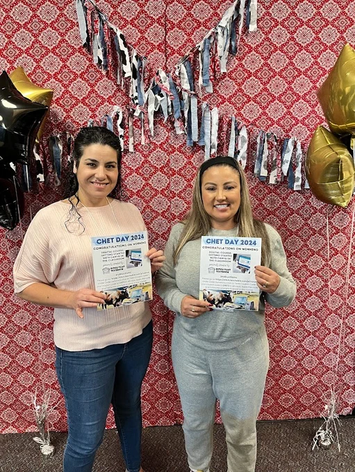 2 smiling teachers holding Ditch That Textbook course certificates