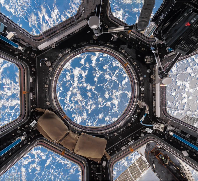 Image from the ISS: Looking out of the 'Cupola,' an observation window of the ISS built by the European Space Agency. The dome weighs over 1800kg and is equipped with shutters in case of contact with micrometeorites and debris. 

PHOTOGRAPH BY PAOLO NESPOLI AND ROLAND MILLER