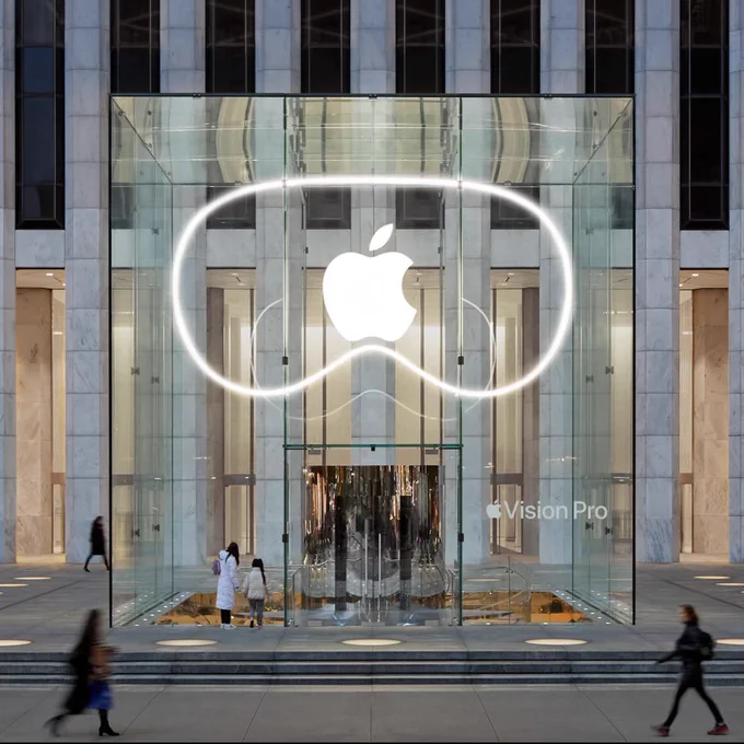 Apple Fifth Avenue, lit up with an outline of Apple Vision Pro