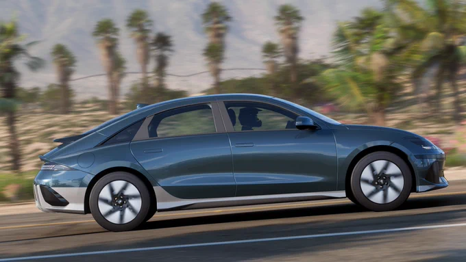 The 2022 Hyundai IONIQ 6 finished in my interpretation of Digital Green (this is a first passthrough, I'll have to tweak it again) driving along the roads along the Club de Opalo de Fuego in Forza Horizon 5.