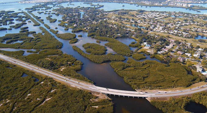Buildup over wetlands and modification of wetland drainage patterns.