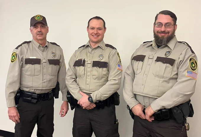 Ranger Supervisor James Stucin, Ranger Edward Eggan, and Ranger James LeMonte