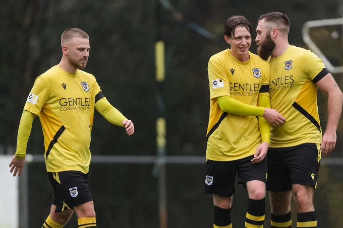 Taffs Well celebrate Vaughn Fowler's second goal against Cwmbran Celtic. 