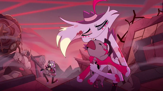 Angel hugs Fat Nuggets among the ruins as Charlie hold Keekee in the background 