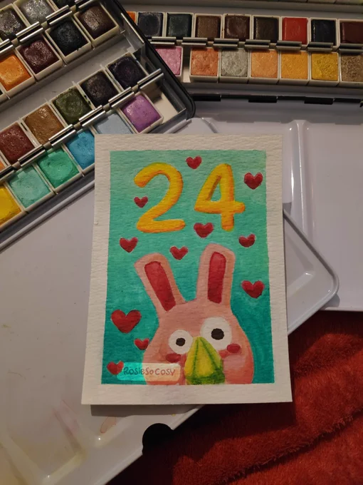 A pink Freezer Bunny holding a green plumbob. The number 24 is floating above the Freezer Bunny. Red hearts all around on a turquoise and teal gradient background.