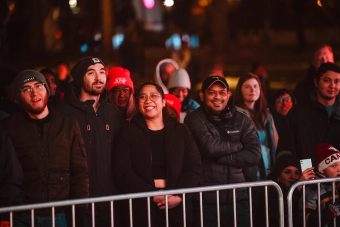 Folkies smile while gathering outdoors at Olympic Plaza to watch Block Heater 2023