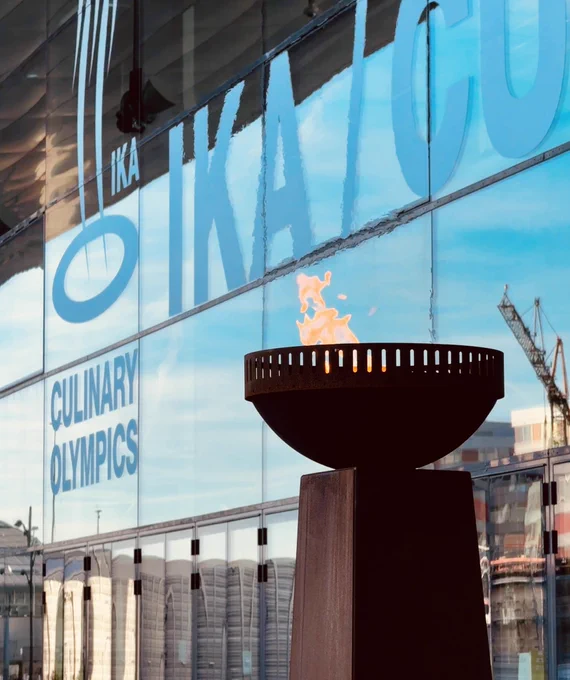 Olympisches Feuer auf der Kochmesse