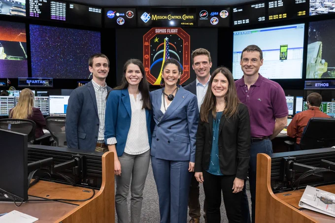 Members of NASA's 2022 Class of Flight Directors pose with Diana Trujillo during her first shift and team naming ceremony in Mission Control Houston. 