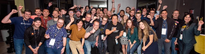 Most of the speakers & workshop from the AI Engineer Summit 2023 celebrating with a photo together during the speaker's dinner. 
