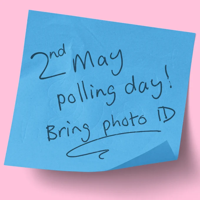 Blue post-it note stating '2nd May polling day! Bring Photo ID'.