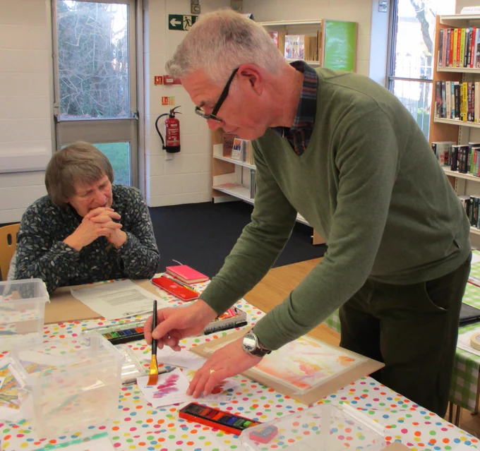 artist demonstrating technique