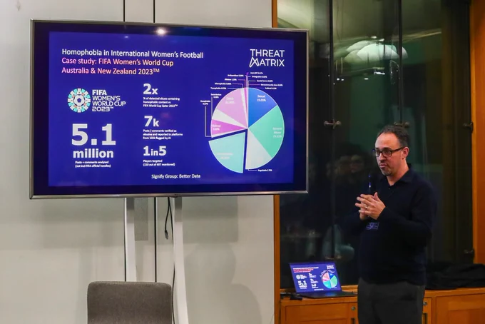 Signify CEO Jonathan Hirshler presents a slide of data