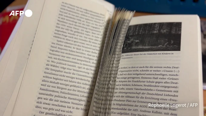 A book with torn out pages is pictured at the library Tempelhof-Schoeneberg in Berlin 