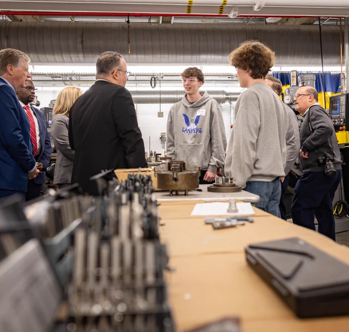 Secretary Cardona talking with students in a career and technical education program in Rhode Island.