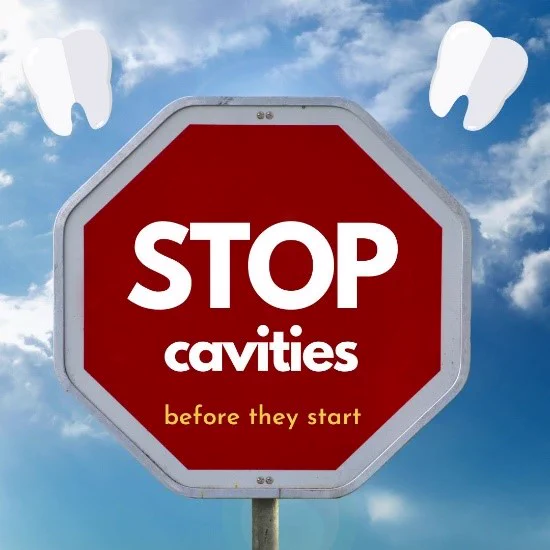 Stop sign against blue sky with cartoon teeth above reads: STOP cavities before they start