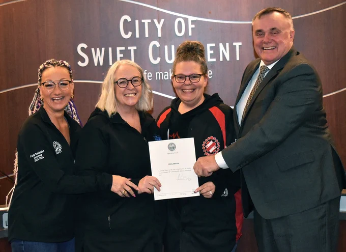 Pictured with the proclamation at the Feb. 20 regular City of Swift Current council meeting, from left to right, Swift Current Kinettes members Paula Sundquist, Tracy Prang and Stephanie Krahn with Mayor Al Bridal.
