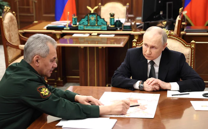 Russian President Vladimir Putin meets with Defence Minister Sergei Shoigu at the Kremlin, February 20, 2024