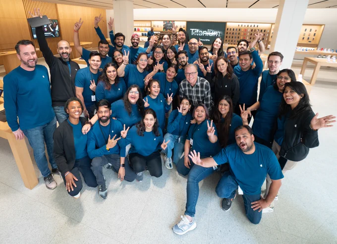 Joz with a group of Apple retail employees at Apple Saket.