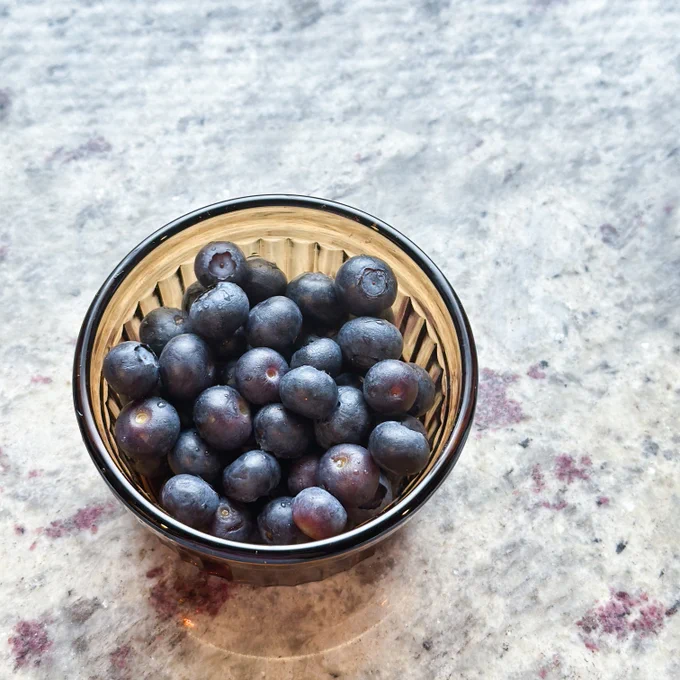 The clean blueberries in a little bowl.