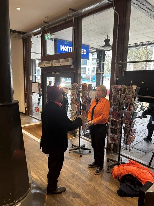 Person being interviewed in watershed box office