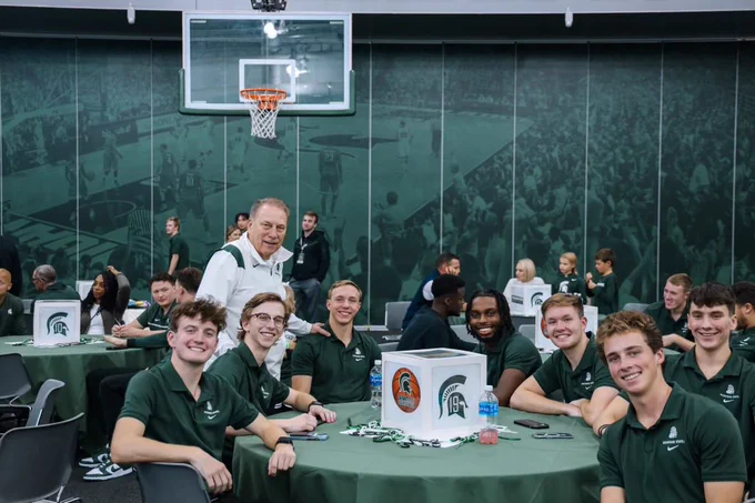 Student managers and Coach Izzo