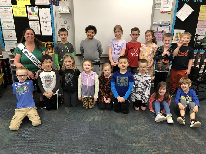 Stanton Elementary teacher Karen Gibson and her class smile for a picture.