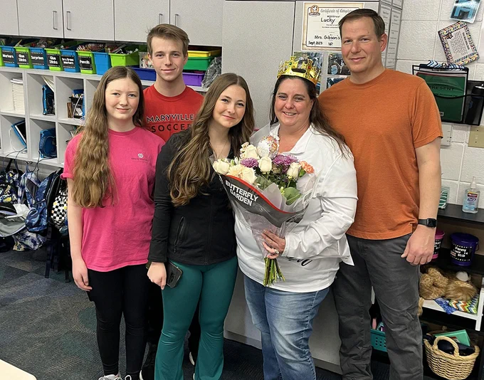 Stanton Elementary teacher Karen Gibson and her family members smile for a picture.