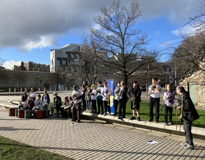 The Trumberbone Street Band performance outside Scottish Parliament.