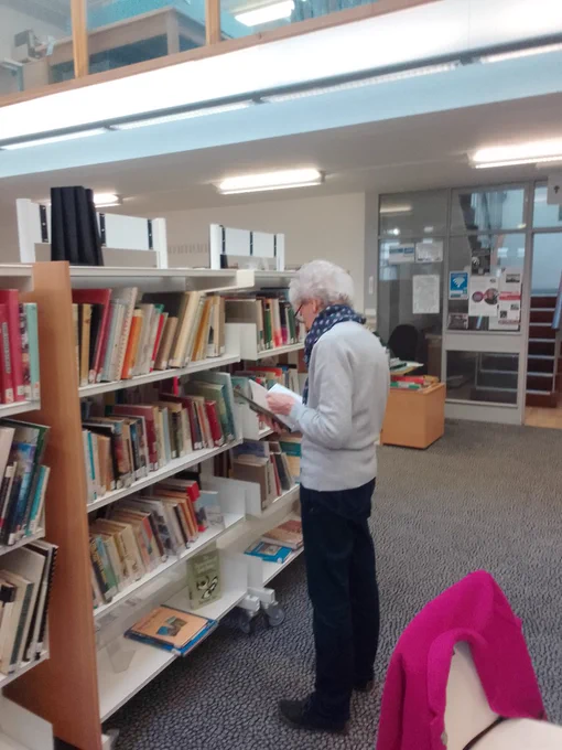 Volunteers enjoying reading the local history books at Lancaster Library.