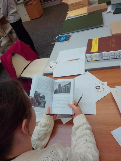Volunteers researching stories for the new show 'Clomping About' at Lancaster local history.