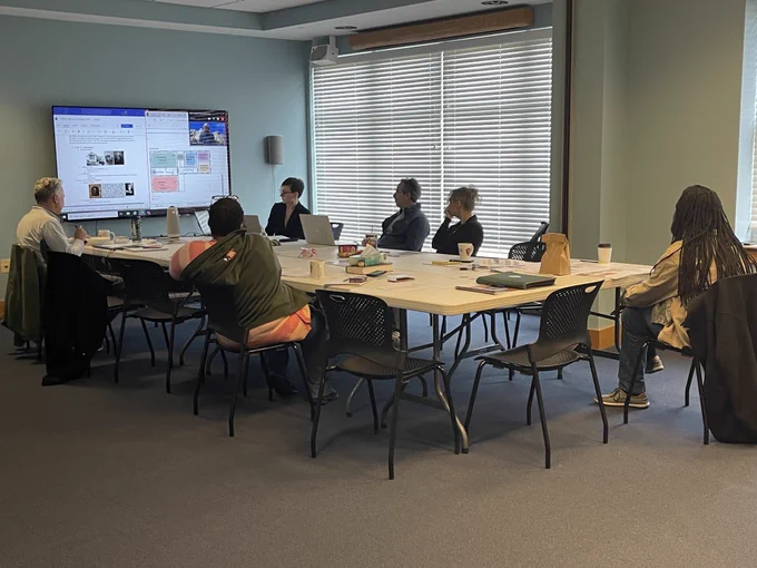 TDM members present new designs to the NPS project team.