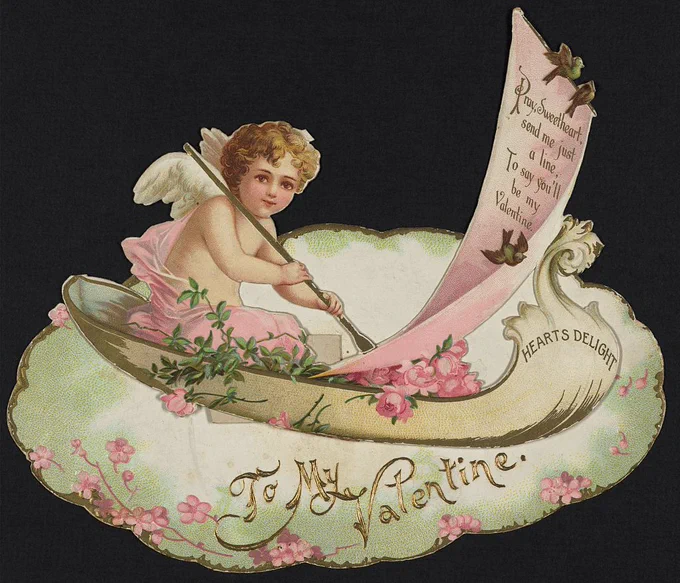 An old Valentine card on a black background. A cherub sits in a small boad labeled "Heart's Delight". Underneath, "To My Valentine" is written on a green background above pink flowers. 