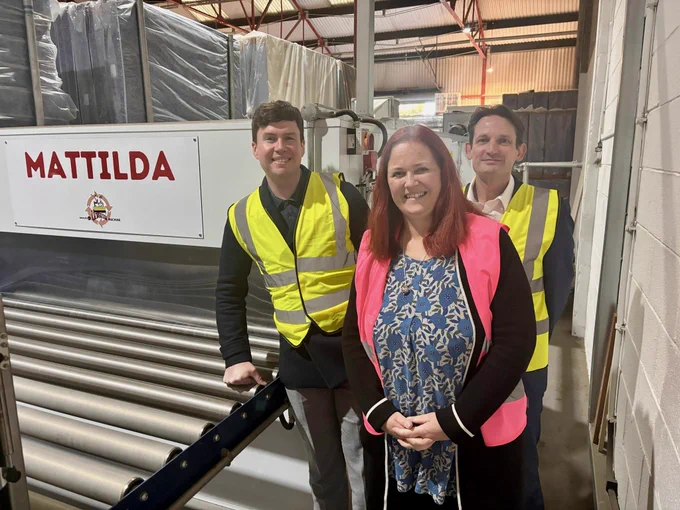 Dan Carden MP and FRC Group staff with Mattilda – a machine that restores old mattresses to high-quality condition.