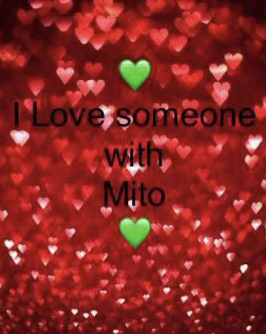 Image Description: background flooded with blurred out small hearts in various shades of red, some look like they are glinting. In the centre there is a green heart and below reads  in black plain text, I love someone with Mito, underneath is another green heart.