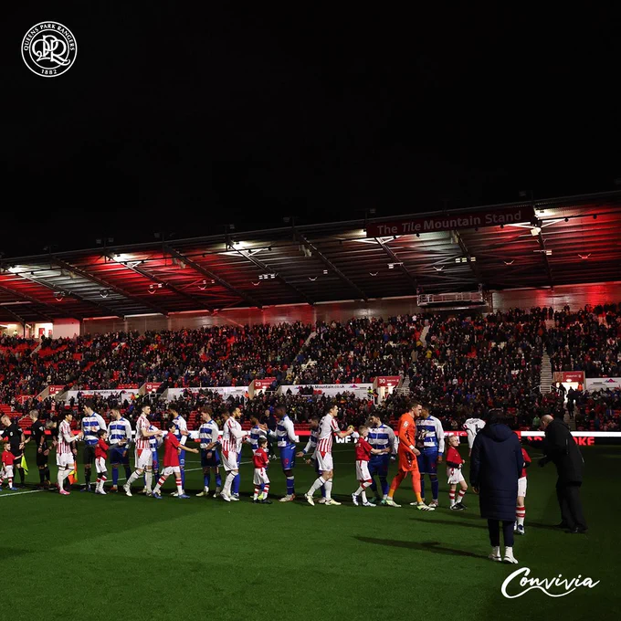Stoke City and QPR players shaking hands before Wednesday night’s game at the bet365 Stadium.