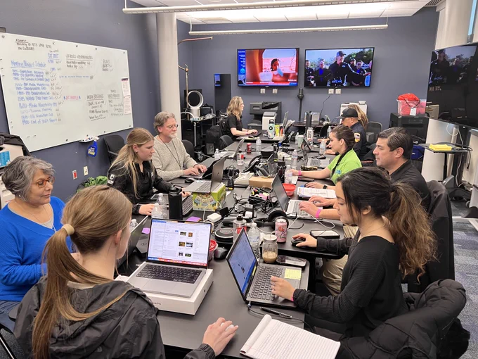 Public Information Officers from various state agencies working in the Joint Information Center. 