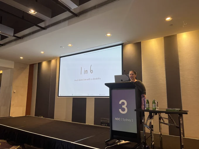 Jess presenting that 1 in 6 Australians live with a disability