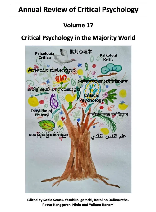 A picture of the Annual Review of Critical Psychology Journal with  cover featuring a tree of life. The tree handles flowers, leaves and birds of the cultures of the authors. The phrase critical psychology is featured on the cover in the various languages spoken by the authors.