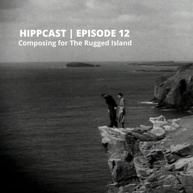A black and white film still of a couple peering over a cliff edge. Text reads: HIPPCAST | EPISODE 12 Composing for The Rugged Island'.