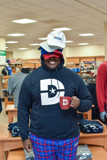 Student wearing a lot of dallas college merchandise