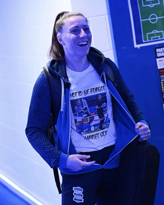 Lucy Quinn wearing a ‘Not to be Forgotten, Harriet Scott.’ t-shirt.