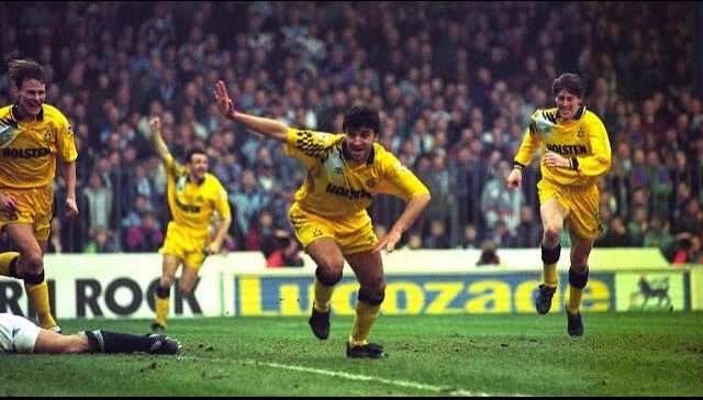 Nayim celebrates his hat trick in the 4-2 FA Cup QF tie at Man City. It was our fourth victory over City that season having done a league double and also won 1-0 in the League Cup. This game is also remembered for an ugly pitch invasion (instigated by the home fans) which led to both teams being taken off the field until police horses intervened. 