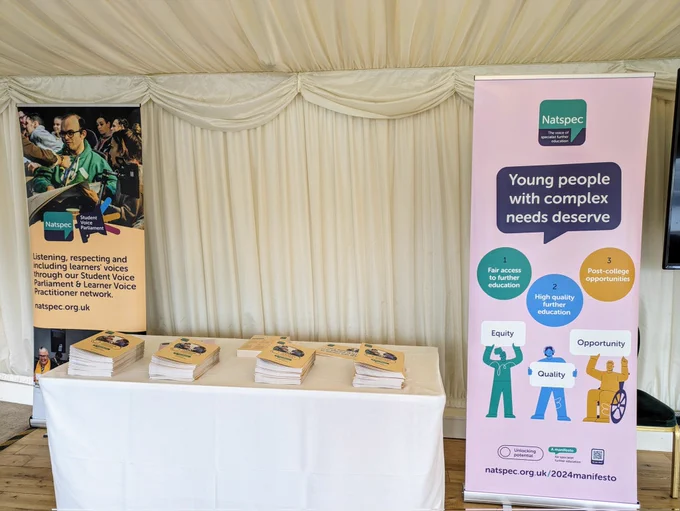 Copies of the Natspec manifesto on table alongside a banner reading "Young people with complex needs deserve Equity Quality Opportunity"