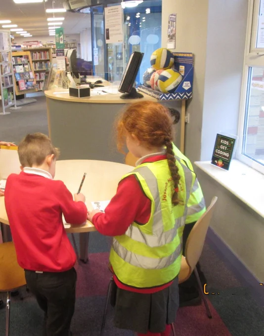 Yr2 pupils at Raynes Park Library