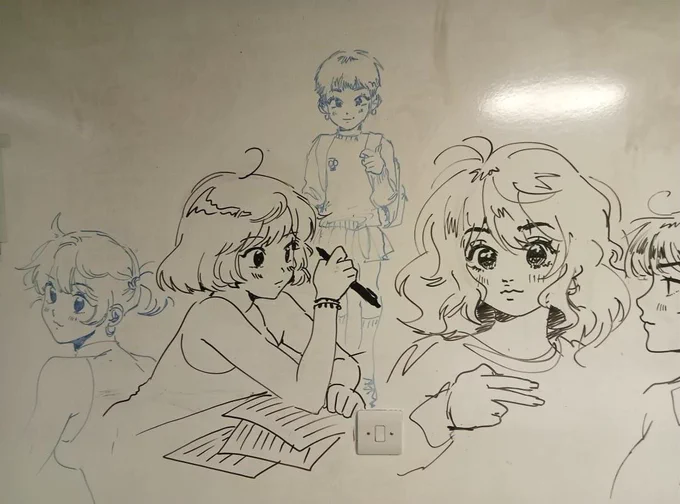Image of an artist's Manga-style drawing of various people on a whiteboard