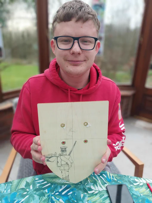 Volunteer designing Roper family Coat of Arms 