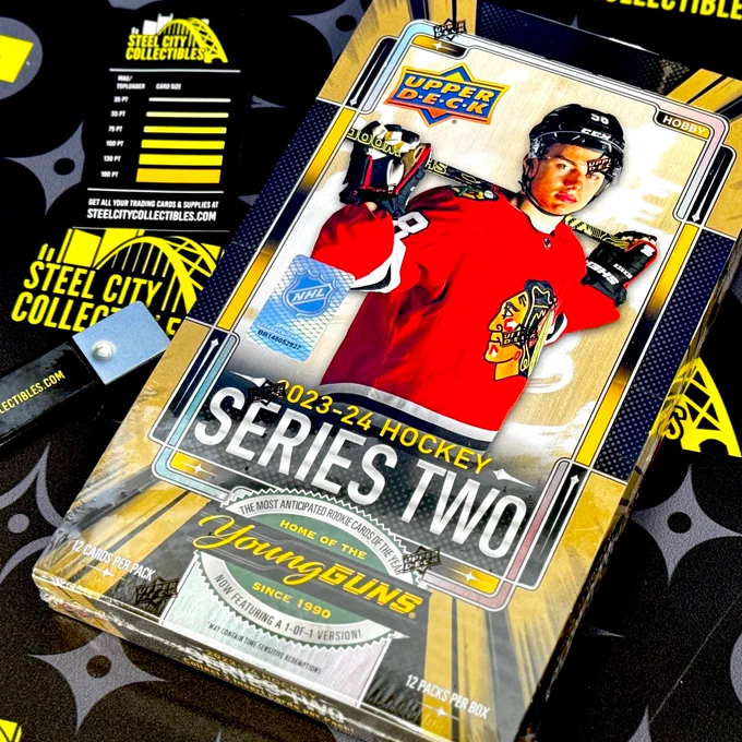 2023-24 Upper Deck Series 2 Hockey Hobby Box

Configuration: 12 cards per pack. 12 packs per box. 12 boxes per case.

Look for 6 Young Guns® Cards, 10 Director of Boards, Ecliptic, Instinctive and/or PC’s Cards (New!), 6 Honor Roll® and/or UD Portraits Cards, 4 UD Canvas® Cards (Includes Young Guns®, Retired & Program of Excellence Subset Cards), 3 Deep Roots Cards (New!), 2 Director of Boards, Ecliptic, Instinctive and/or PC’s - Sparkle Parallel Cards (New!), 1 Base Set - Clear Cut Parallel, UD Canvas® - Black & White Parallel or Fluorescence Red Card, 1 Base Set - Outburst Parallel Card (Veteran or Young Gun), 1 Monster Season or Glaring Card (New!), 1 Blue Dazzlers Card, and 1 Wildcard (Includes all Rare Ratio’d & #’d Cards) per box on average.

Chase Young Guns Rookie Cards of Connor Bedard, Alex Laferriere, Matt Murray, Leo Carlsson, and many more! Get all of your 2023-24 Upper Deck Series 2 Hockey from Steel City Collectibles only on SteelCityCollectibles.com.
